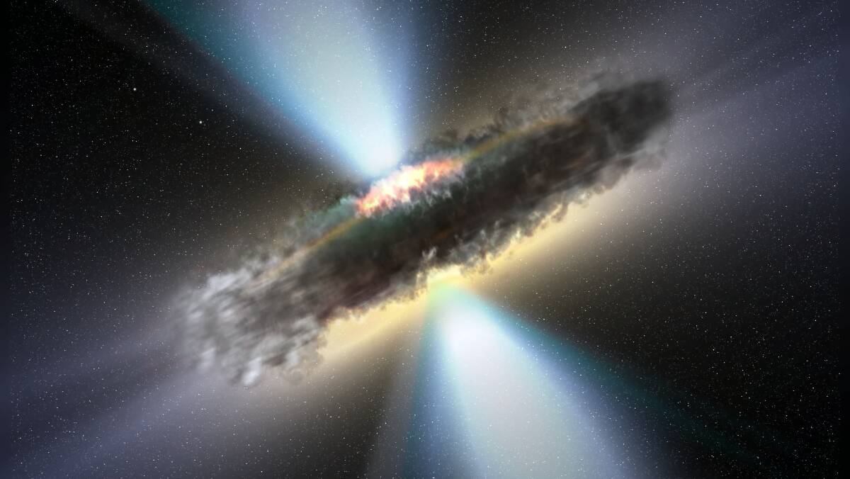This artist's impression shows the thick dust torus that astronomers believe surrounds supermassive black holes and their accretion discs. Picture: European Space Agency