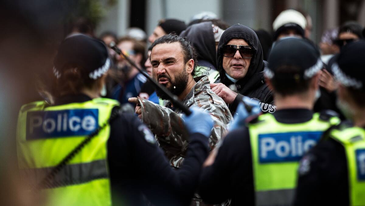 Protesters have clashed with members of Victoria Police at an anti-lockdown rally in Victoria. Picture: Getty