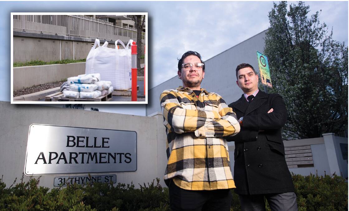 Jose Alejandro Ruiz and Deniss Cirulis standing outside the Belle Apartments in Bruce, which have been plagued with defects for several years. Picture by Keegan Carroll