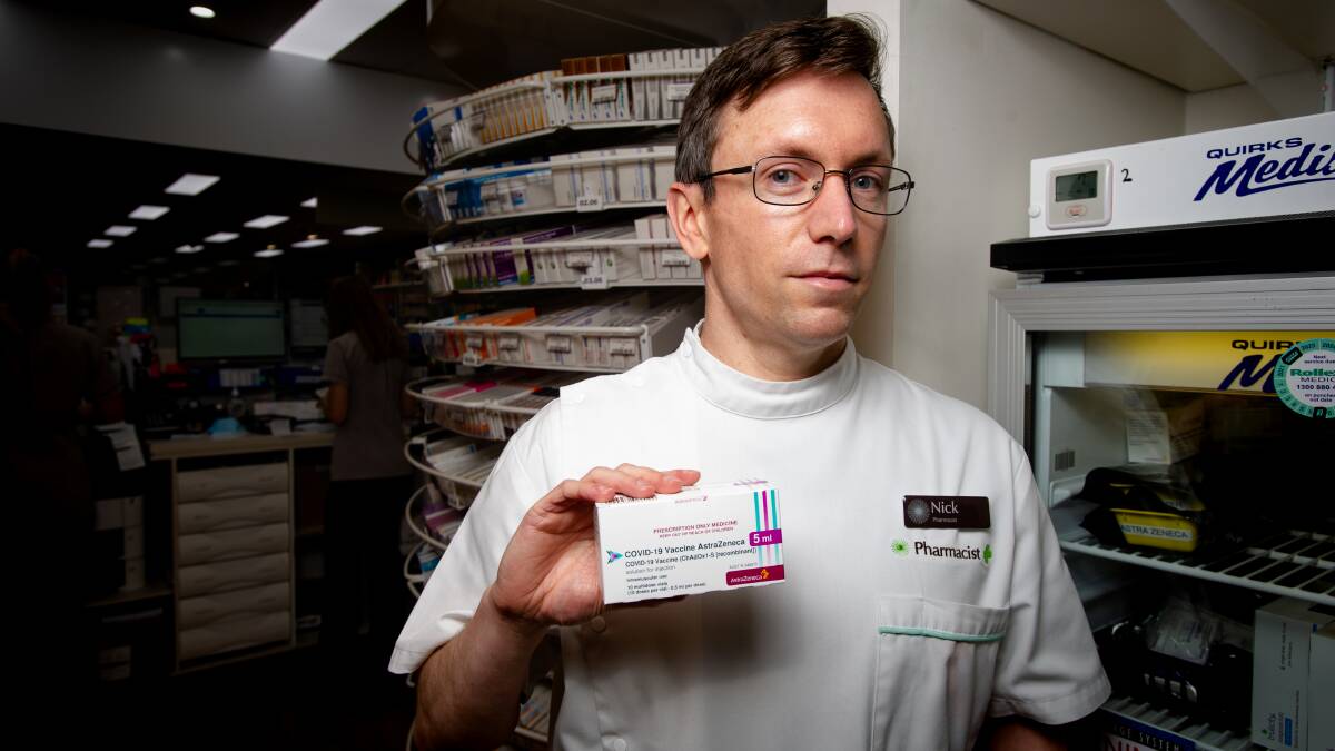 Erindale pharmacist Nick Trevethan with AstraZeneca stock after 400 doses were returned because of slow booster uptake. Picture: Elesa Kurtz