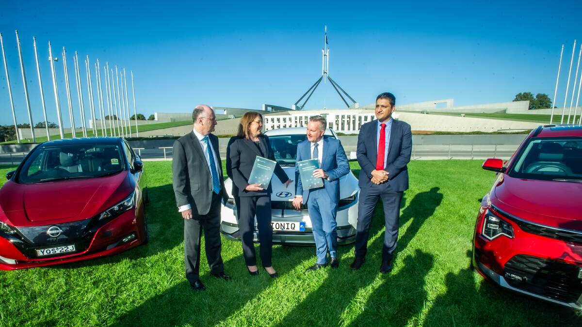Climate Change and Energy Minister Chris Bowen and Transport Minister Catherine King announce the federal government's response to the National Electric Vehicle Strategy, flanked by Tony Weber, chief executive Federal Chamber of Automotive Industries, left, and Behyad Jafari chief executive Electric Vehicle Council, right. Picture by Karleen Minney