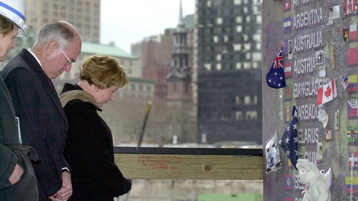 Prime Minister John Howard and Janette Howard pay their respects at the World Trade Centre Memorial in New York, January 2002. Picture by David Foote