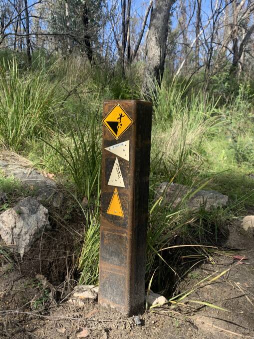 Look out for this sign for which signals the start of the new Mt Tennent track. Picture: Tim the Yowie Man