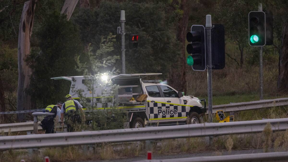 The police collision investigation team inspects the site of the crash. Picture Canberra Times