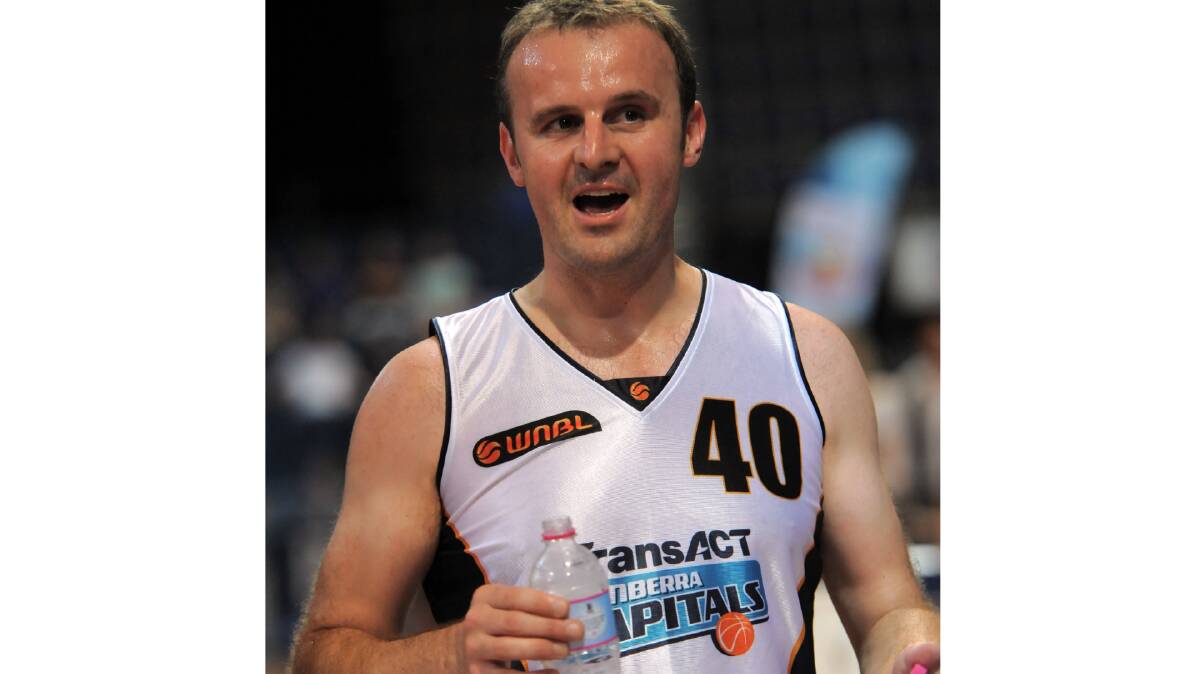 Then sport minister Andrew Barr plays in a celebrity basketball game at the AIS Arena in February 2011. Picture: Graham Tidy