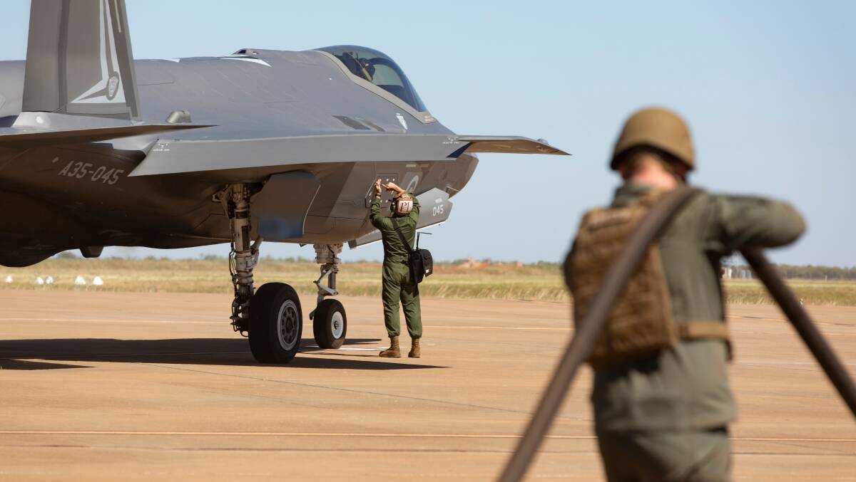 United States Marine Corps marines, assigned to Marine Aircraft Group 12, prepare to refuel a F-35A Lightning II aircraft. Picture Department of Defence