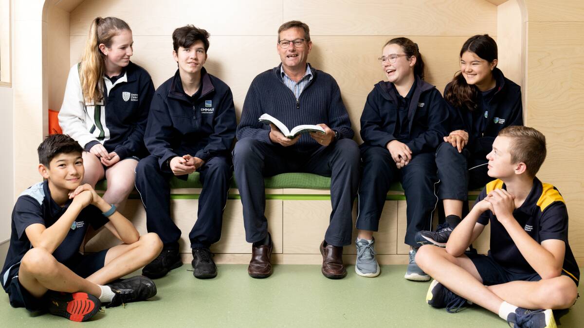 Emmaus Christian School Principal Erik Hofsink with year 8 to 10 students as some schools drop compulsory masks. Picture: James Croucher
