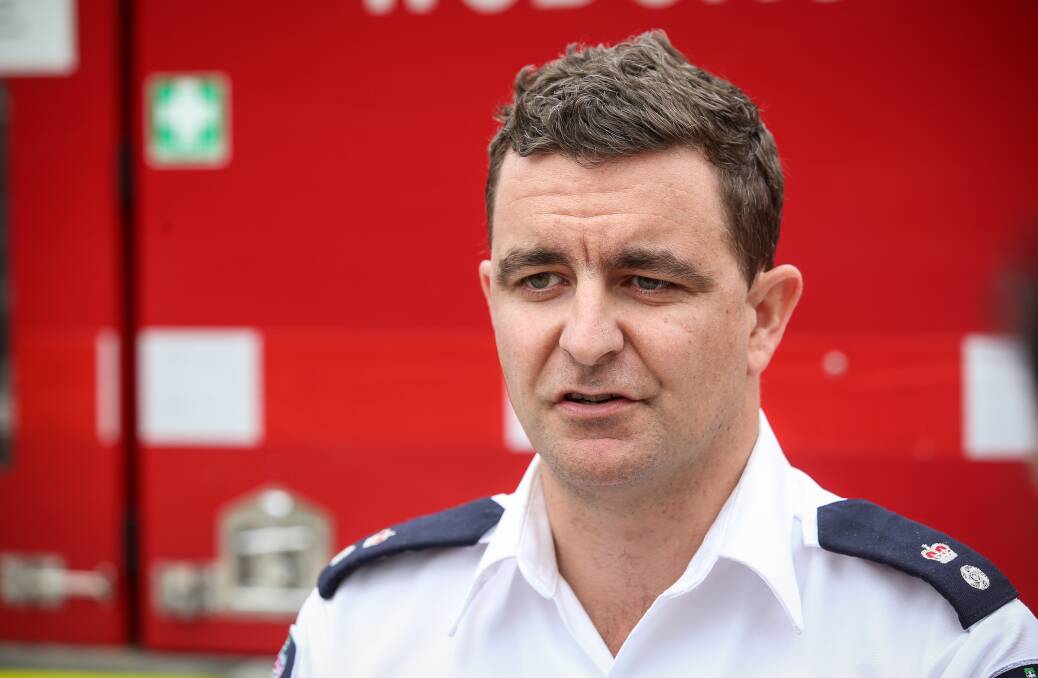 Terrible situation: Rural Fire Service superintendent Patrick Westwood who joined his commissioner and service chaplain in consoling the wife of Sam McPaul.