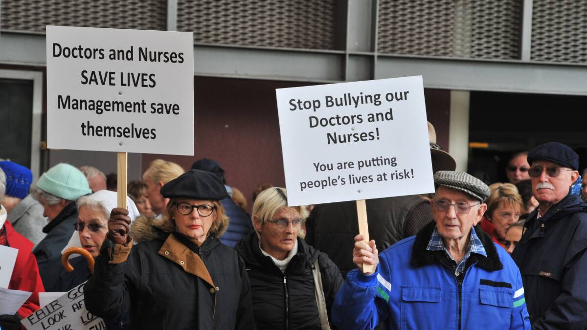 Max Hazelton (right) at a protest for better working conditions for doctors and nurses in 2019. Picture by Jude Keogh.