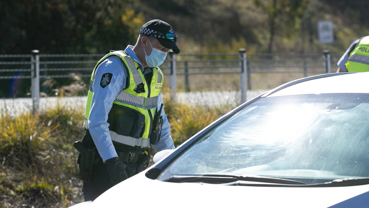 ACT police conducting border compliance checks on vehicles on the ACT/NSW border. Picture: Keegan Carroll