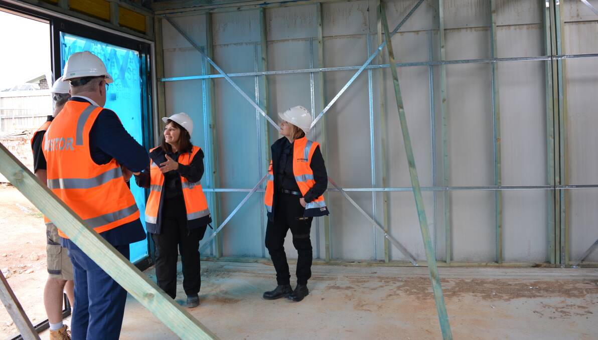 Work Health and Safety Comissioner Jacqueline Agius on a residential construction site at Denman Prospect on Tuesday morning. Picture: Supplied. 