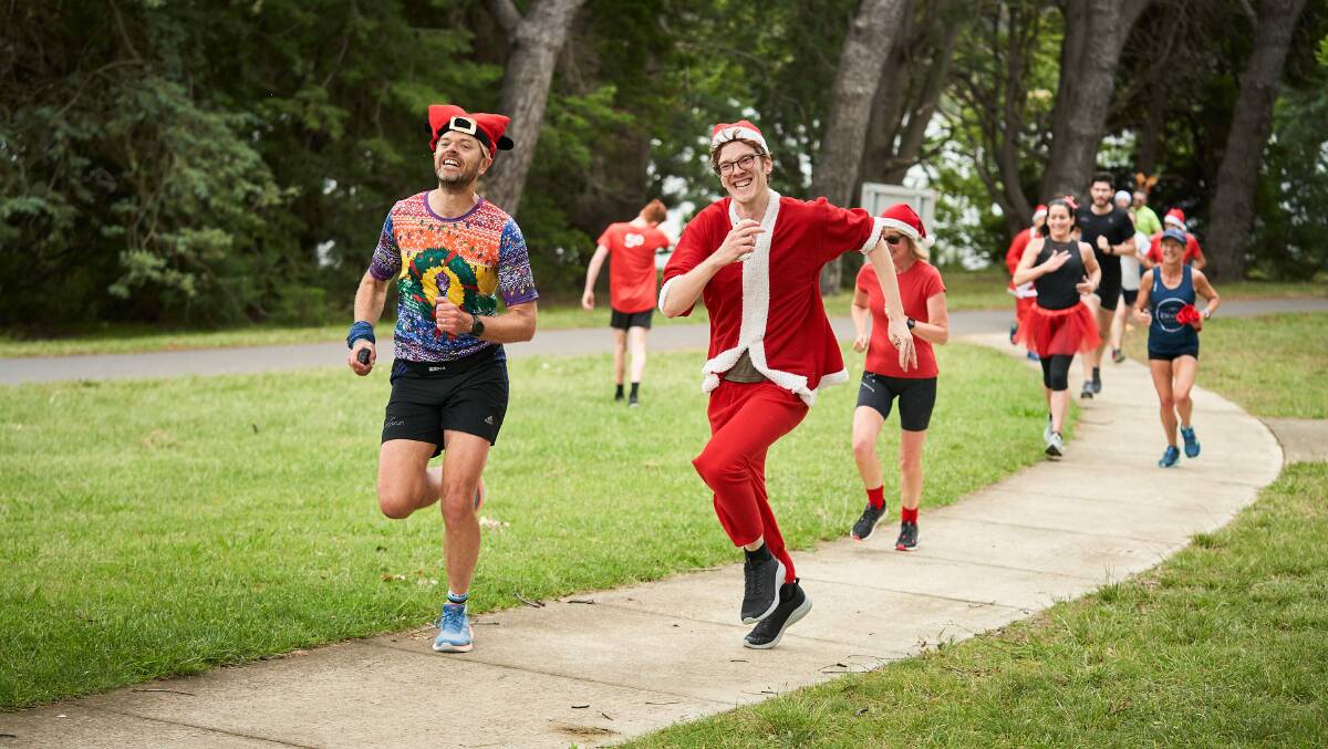 William Barlow and Jonathan Mettes from McGregor at the Christmas Park Run. Picture: Matt Loxton