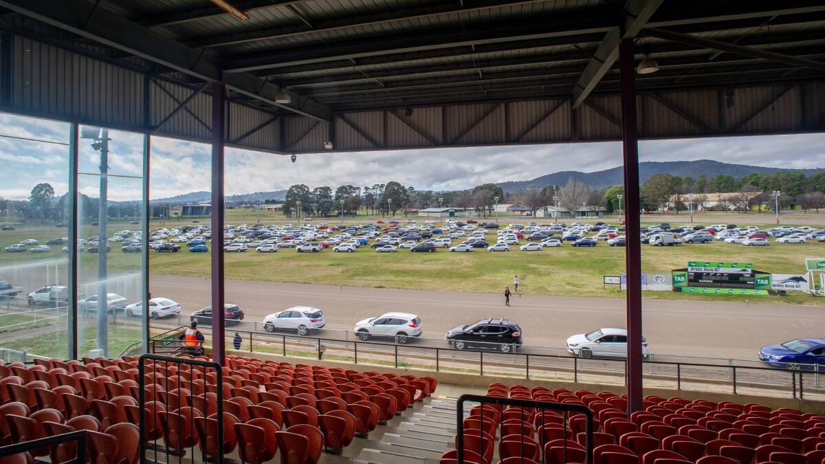 Canberrans lined up for Covid testing at the EPIC location wait for hours on the centre showground before making it to the testing centre. Picture: Karleen Minney