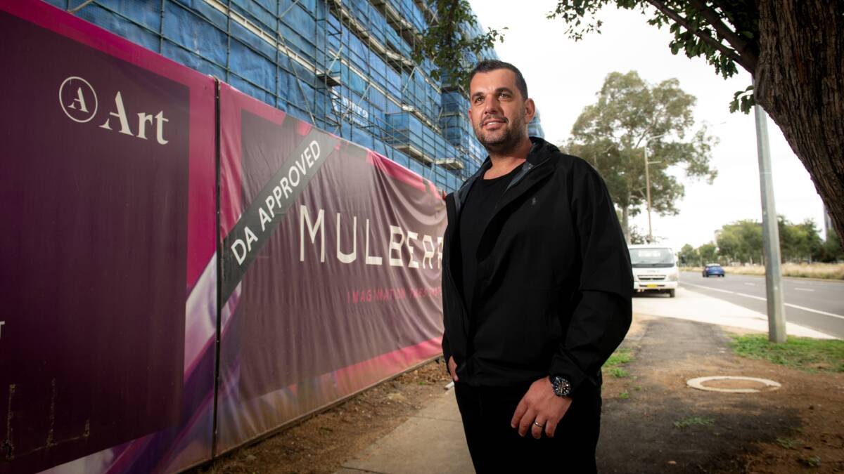 Art Group managing director Johnny Roso at the first stage of the precinct on the site of the former Dickson public housing. Picture: Elesa Kurtz. 