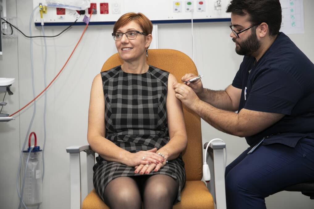 ACT Health Minister Rachel Stephen-Smith recieving her covid vaccine. Picture: Keegan Carroll