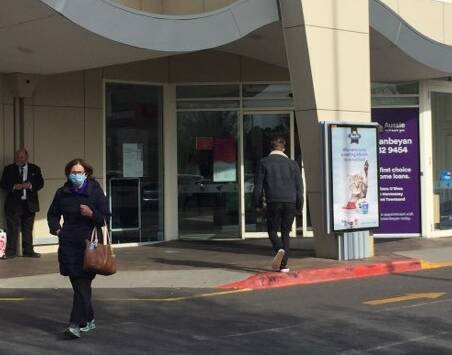 People in indoor areas such as grocery stores are strongly advised to wear masks in NSW. 