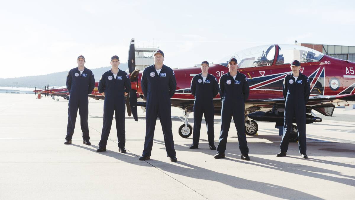 Roulette aerobatics team pilots Mark Keritz, Nathan Stankevicius, Jamie Braden, Ben Hepworth, Daniel Barclay, and Lachie Hazeldine at Canberra Airport with the PC-21 aircraft. Picture: Dion Georgopoulos