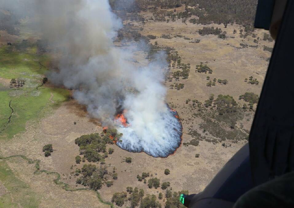 The Australian Defence Force has released photos taken by the crew of the helicopter which accidentally sparked the Orroral Valley fire. Picture: ADF