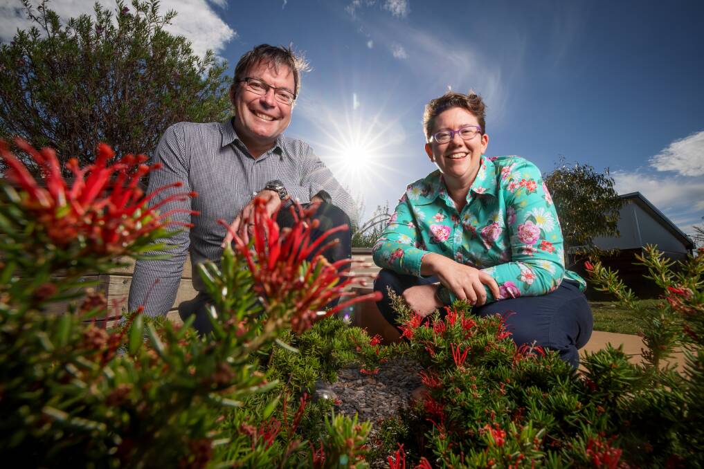 Ginninderry landscape manager Matt Frawley and sustainability manager Jessica Stewart have led planning to attract bees with diverse flora in the suburbs. Picture: Sitthixay Ditthavong