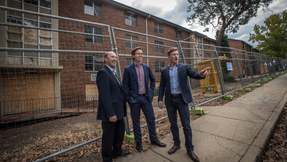 Morris Property Group's Barry Morris, James Morris and Geordie Edwards at the site before the public housing flats were demolished in 2019. Picture: Karleen Minney