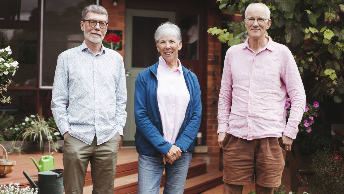 Ian Ross, Trish Macdonald and Joss Haiblen say co-housing is the perfect middle ground between their large family homes and apartment living. Picture: Dion Georgopoulos