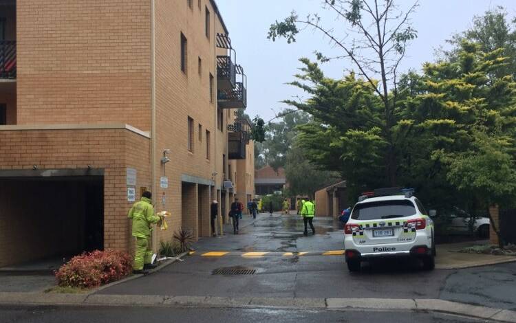 Residents have returned to their apartments after three cars were set alight in carports at a Belconnen unit complex. Picture: Kathryn Lewis