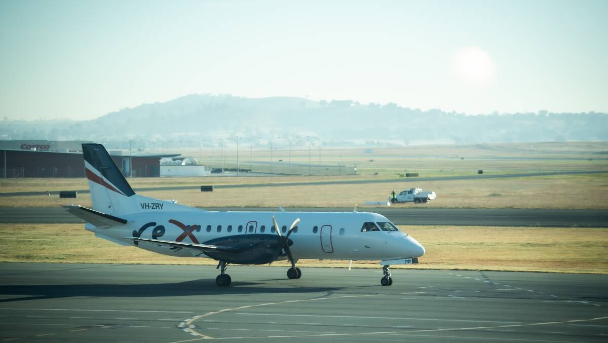 The first Rex flight from Sydney to Canberra touching down at Canberra Airport on Monday. Picture: Karleen Minney