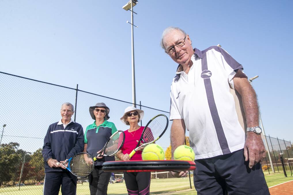 Peter War, Libby Osborn, Lorraine Ovington and Geoff Kotz of the Weston Creek Tennis Club which has recently made the jump to solar power by installing panels on the clubhouse roof. Picture: Keegan Carroll