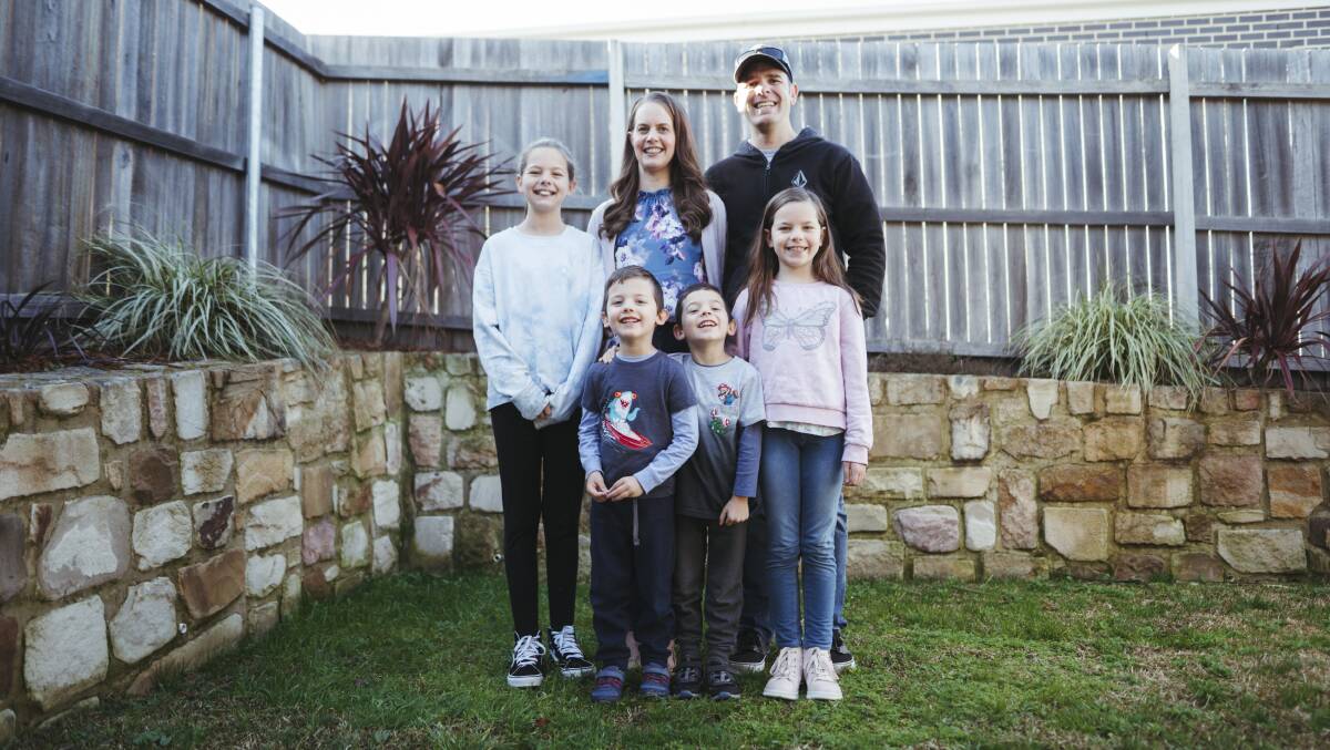 Anne and Michael Olsen, along with their four children Lachlan, Thomas, Isabella and Sophie, were caught up in a false-positive Covid scare. Picture: Dion Georgopoulos
