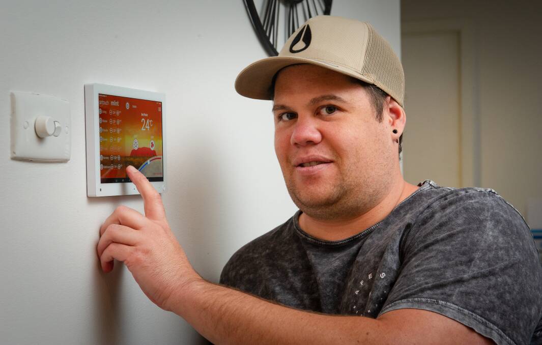 Conder resident Ashley Knight replaced a gas heater with an electric one in his home. Picture: Elesa Kurtz