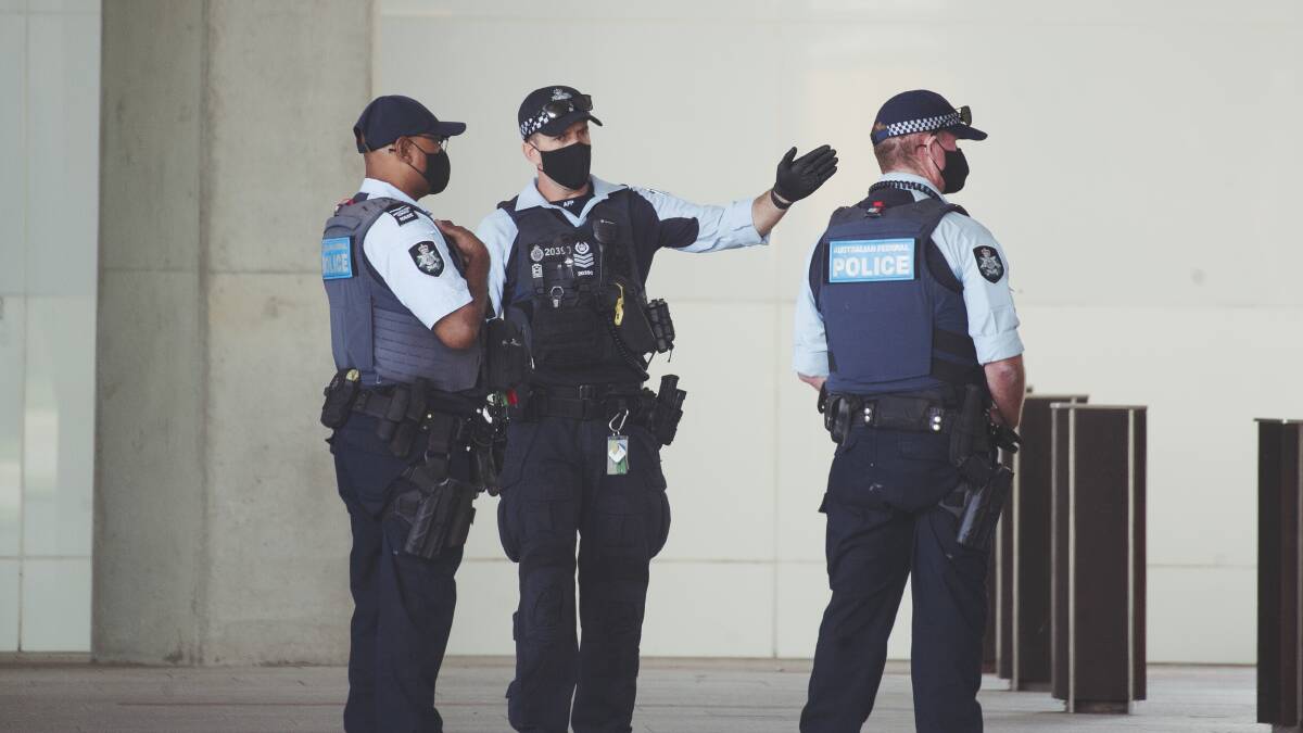 AFP officers at Canberra Airport. Picture: Dion Georgopoulos