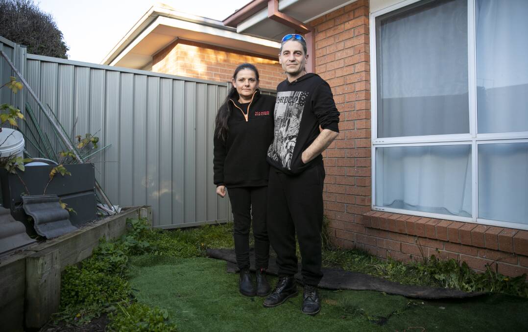 Ngunnawal residents Kalli Saimos and Robert Grooby, who have been facing flooding issues on their property from a mysterious underground water source. Picture: Keegan Carroll