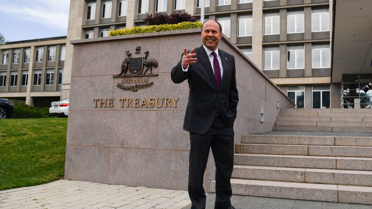  Treasurer Josh Frydenberg arrives at the Treasury offices on Monday. Picture: Getty Images