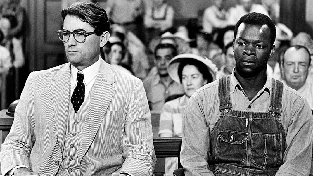 Atticus Finch and Tom Robinson, characters in To Kill a Mockingbird. 