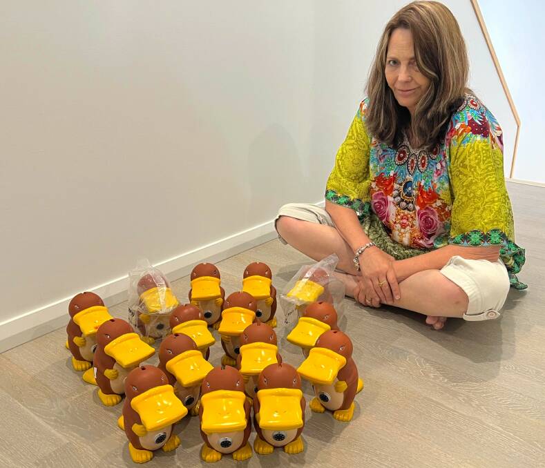  Karen Collins with some of her platypus money boxes. Picture by Craig Collins