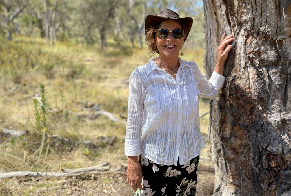 Julie Rickwood at the "guardian tree" which overlooks the Five Senses labyrinth on Mt Ainslie. Picture by Tim the Yowie Man