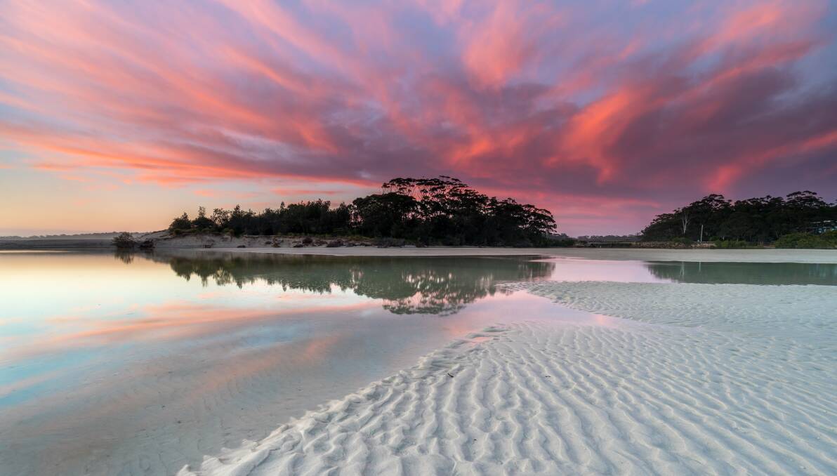 Sunset at Moona Moona Creek, one of many white sand beaches on the 'Round the Bay' track. Picture: Jordan Robins