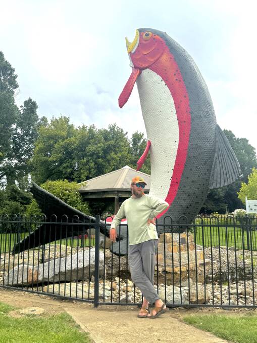 Michael Shanahan - aka Mikey Finn - is embarrassed by the paint job on Adaminaby's Big Trout. Picture by Tim the Yowie Man