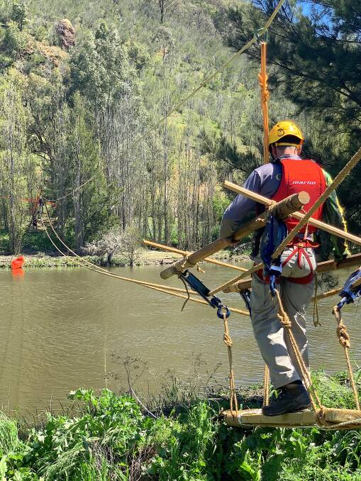 Gino Monteleone about to test the 100m rope bridge. Picture: Tim the Yowie Man