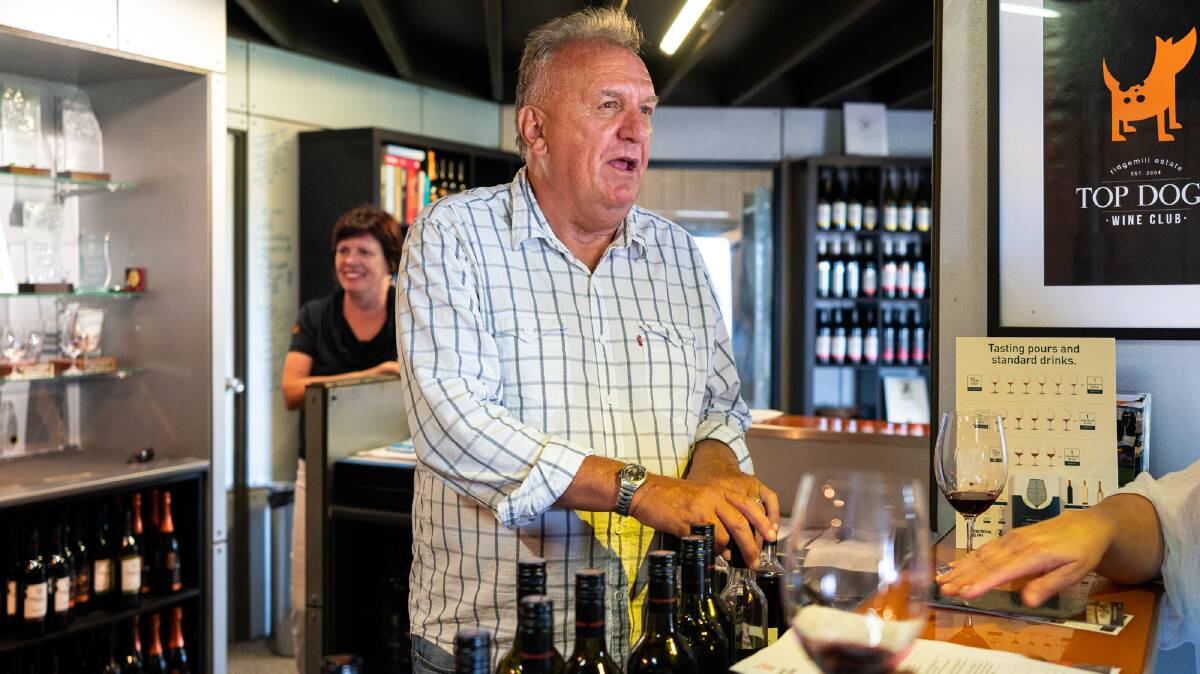 Martin Cooper takes a wine tasting at his winery, Ridgemill Estate.