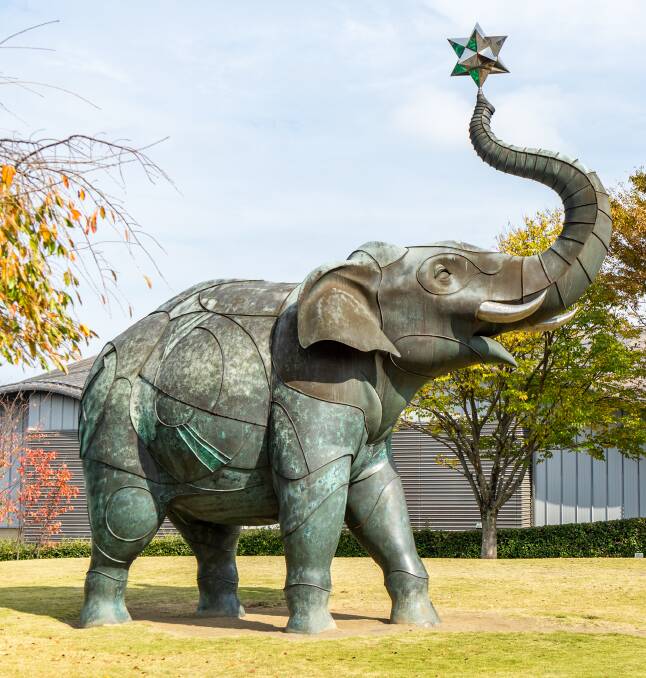 A 20-metre-tall elephant sculpture stands outside the Oita City Art Museum.