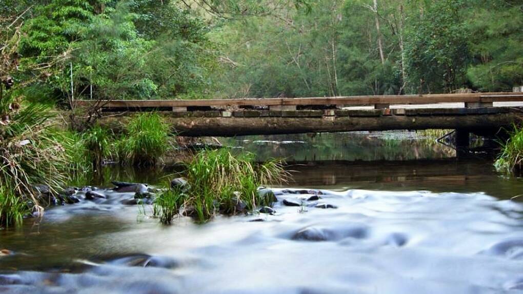 This wooden bridge, spanning the Currowan Creek about 20km north-west of Batemans Bay, was washed away in 2019 by a flood. Picture: Jacqueline Moy