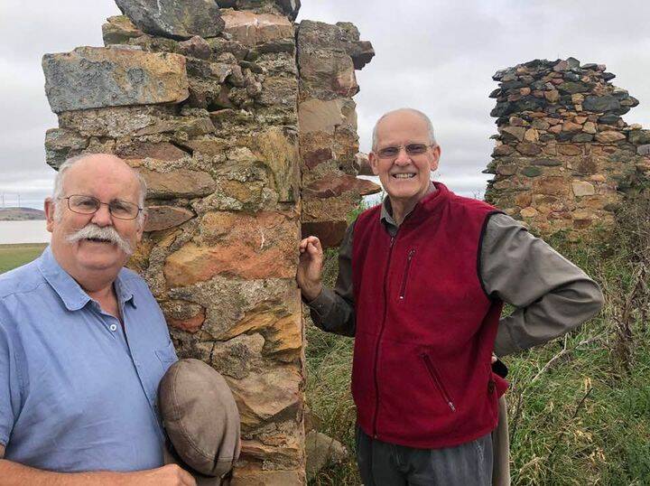 Brothers Paul and Chris Rule at Kennys Point ruins, on the shore of Lake George. Picture: Jenny Rule