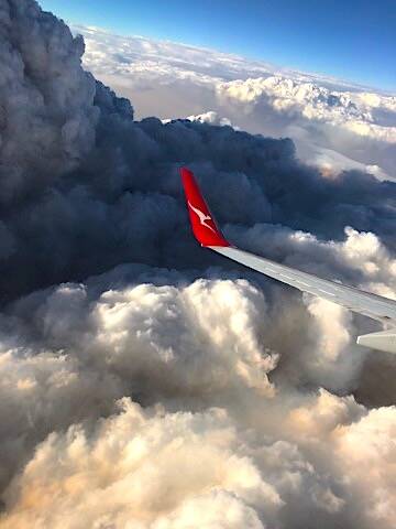  Pyrocumulous clouds photographed by Vicki McDonough out the window of a commercial flight over the Australian Alps in January 2020.