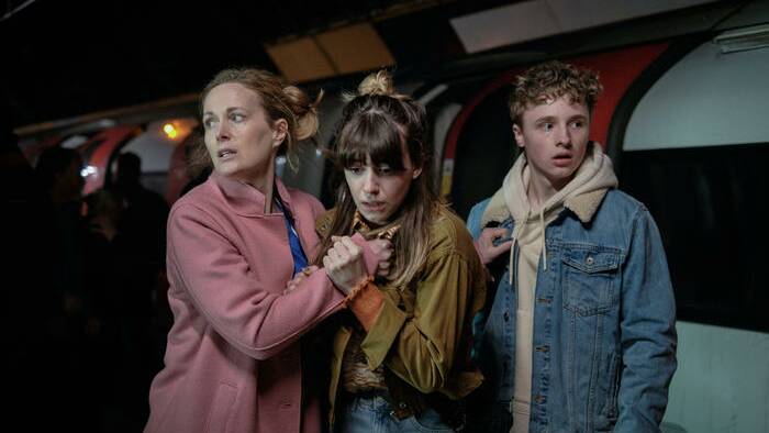 Sarah (Natasha Little), daughter Emily (Daisy Edgar-Jones) and son Tom (Ty Tennant) get caught up in the panic in War of the Worlds. Picture: SBS
