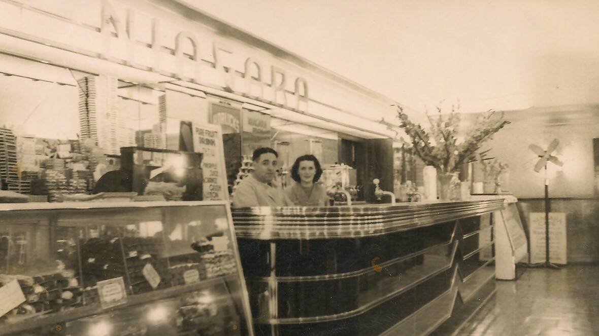 Jack Castrission and an unidentified waitress shortly after the 1938 refurbishment which included the installation of the art deco counter. Picture: Peter Castrission