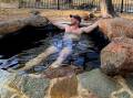 Relaxing in one of the private pools at Talaroo Hot Springs. Pictures: Michael Turtle

