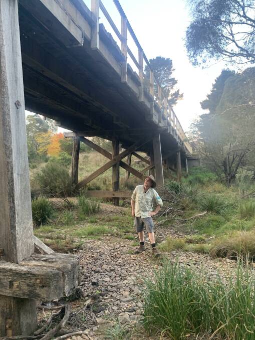 Checking out the historic 1894 Mongarlowe Bridge. Picture by Graeme Rossiter