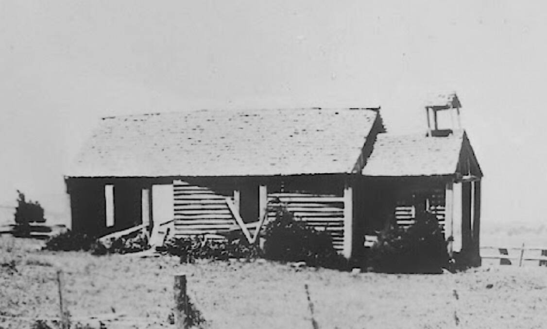 A circa-1915 photograph of the St Paul's Pioneer Church in Evatt when the building was used to store farm equipment. Picture courtesy of Lyall Gillespie Collection/Hall Heritage Centre