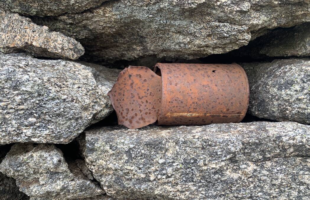 A rusting tin can wedged into the shelter's drystone wall. Picture: Tim the Yowie Man